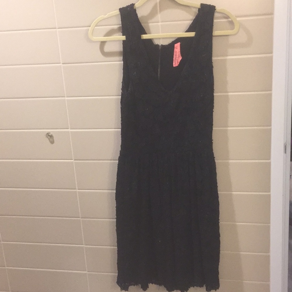 Lacy black dress. Like new. Size medium